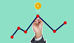 hand charting money on a graph